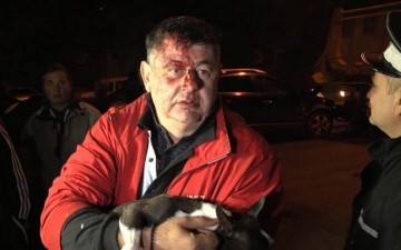 Deputatul PSD Mircia Muntean, coborât de pe gard de poliţie