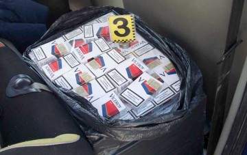 Percheziții într-un dosar de contrabandă cu țigări