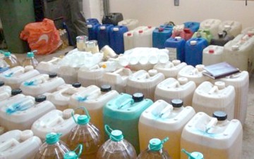 Aproape două tone de alcool, confiscate de poliţişti