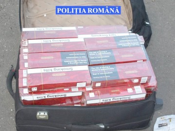 Contrabandişti de ţigări, reţinuţi de poliţişti