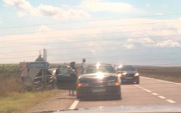 Accident rutier la Cogealac: Audi vs. BMW