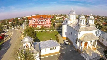 Patru copii necăjiţi, botezaţi la Cumpăna
