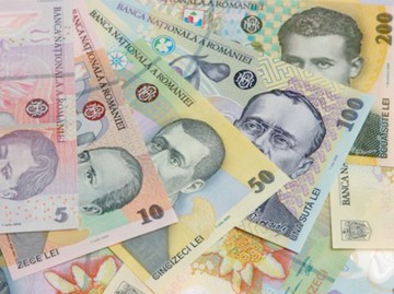 Leul a pierdut teren în raport cu euro şi dolarul american