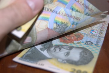 Salariul minim va crește la 1.250 de lei de la 1 mai