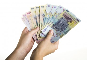 Premieră pe piaţa interbancară post-decembristă: Costul leilor scade la minim istoric