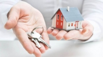 Românii ar putea să-şi cumpere case în leasing, după legea dării în plată