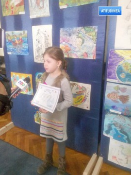 Fetiţa consilierului local Răducu Popescu, premiată de RAJA pentru o pictură