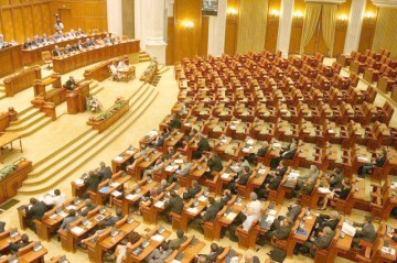 A fost adoptată legea dării în plată