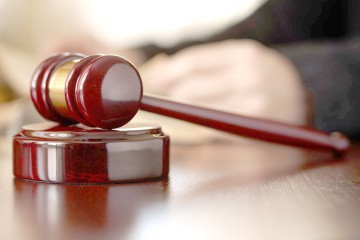 Poliţistul Liviu Buta a fost ACHITAT pentru luare de mită!
