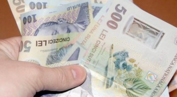 Salariul minim brut crește la 1.250 lei de la 1 mai