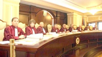Darea în plată, la Curtea Constituţională