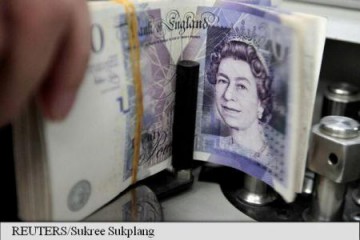 Lira sterlină se tranzacţionează similar unei monede dintr-o piaţă emergentă