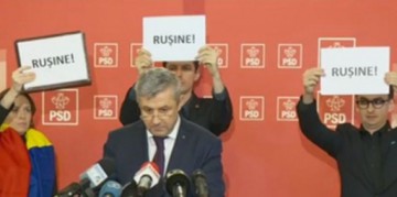 Iordache şi-a întrerupt o declaraţie din cauza pancartelor cu mesajul „Ruşine!”