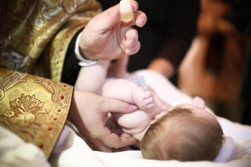 Precizări de la Arhiepiscopia Tomisului: Botezul în post se face cu masă de post