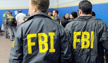 Români prinşi de FBI, după ce au furat 5 milioane de dolari din SUA