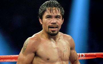 Legendarul boxer Manny Pacquiao va candida la funcţia de preşedinte în Filipine