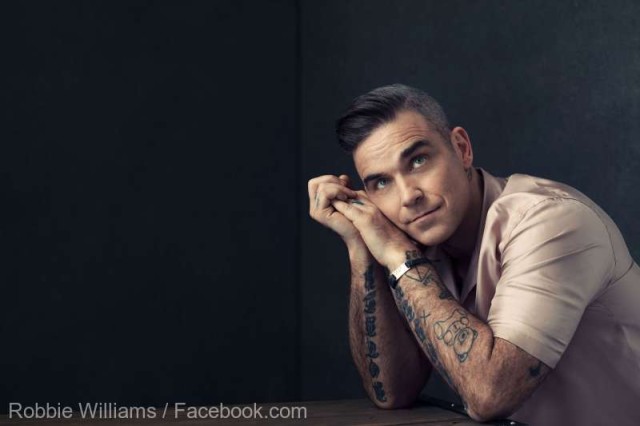 Robbie Williams marchează 25 de ani de carieră solo printr-un album de hituri, în variantă orchestrată