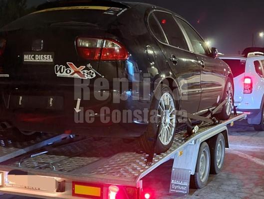 Made în România! Un șofer a fost amendat pentru rovinietă... cu mașina aflată pe platformă 