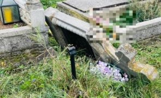 Scene de groază: O femeie a murit după ce o cruce s-a prăbușit peste ea