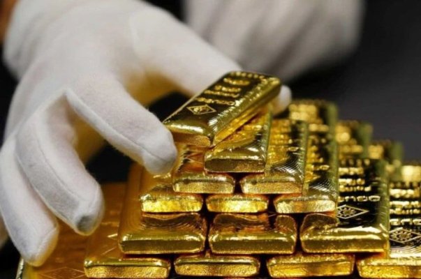 Prețul aurului, aproape de recordurile istorice: 2.400 de dolari, uncia