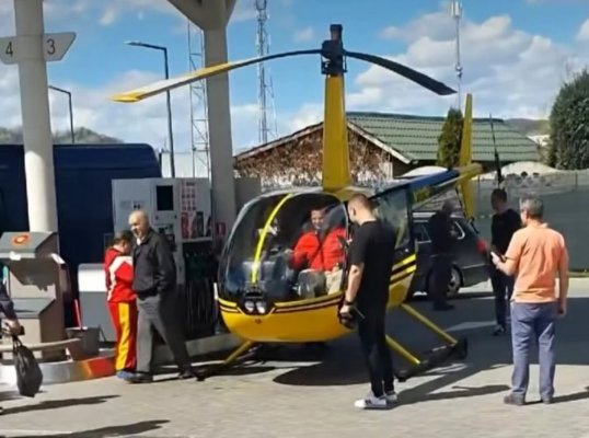 Imagini amuzante în Curtea de Argeș: Elicopter alimentat la o benzinărie 