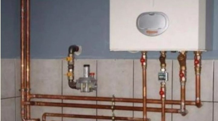 Taxă nouă pentru românii care au centrale în apartament