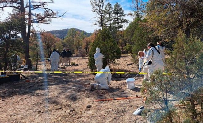 Zeci de cadavre și muniție, găsite într-o groapă comună, în apropierea frontierei cu SUA