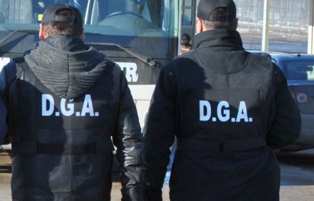 DGA a descins peste rețeaua polițiștilor de la Înmatriculări din Dolj