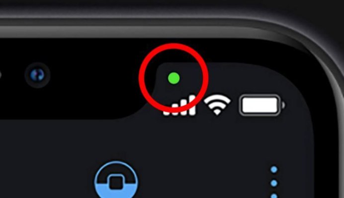 Îți apare un punct verde pe ecranul telefonului? Nu ignora acest semn important