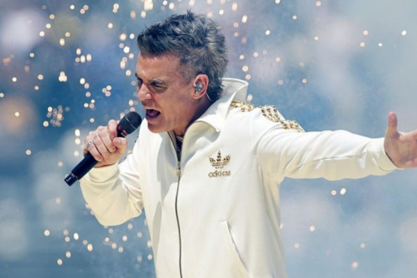 Robbie Williams, pus să dea șpagă în Bulgaria, pentru camioanele în care era echipamentul de concert