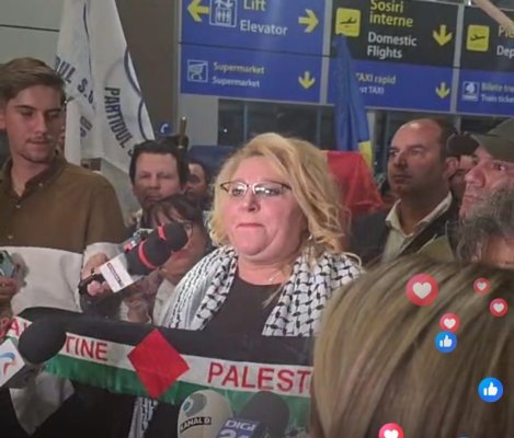 Șoșoacă a fluturat, la Aeroportul Otopeni, steagul Palestinei, a insultat Israelul, NATO, Parchetul General și UE. Video