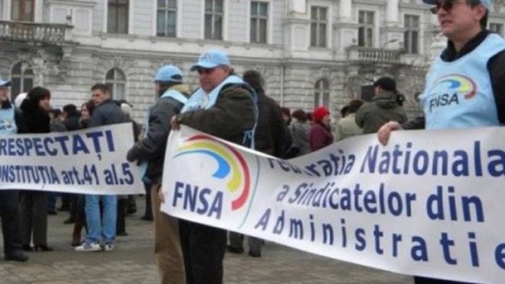 Sindicaliştii din administraţia publică merg peste Ilie Bolojan: Organizează un protest luni în București