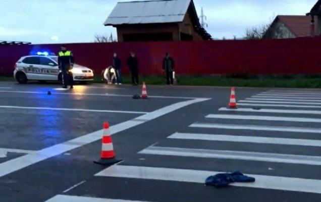 O femeie a fost lovită de o maşină, aruncată sub roţile unui TIR, târâtă 500 de metri și abandonată pe câmp 