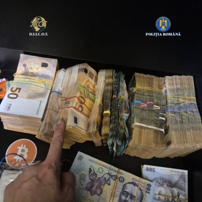 Percheziții în România într-un caz internațional privind o pagină de internet pentru contractarea de asasini