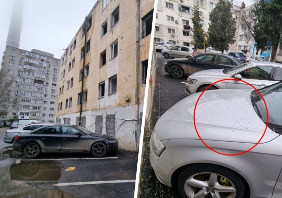 Mașini avariate! Cade tencuiala de pe un bloc abandonat de pe strada Egretei. Video