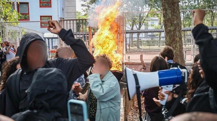 Profesor stropit cu benzină și incendii în școli la protestele care au cuprins Franța. Video
