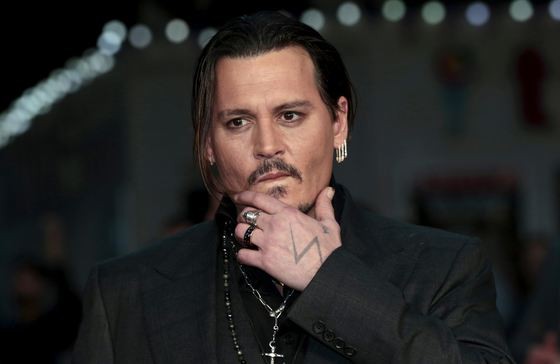 Johnny Depp a ajuns la o înţelegere cu gărzile de corp care l-au dat în judecată