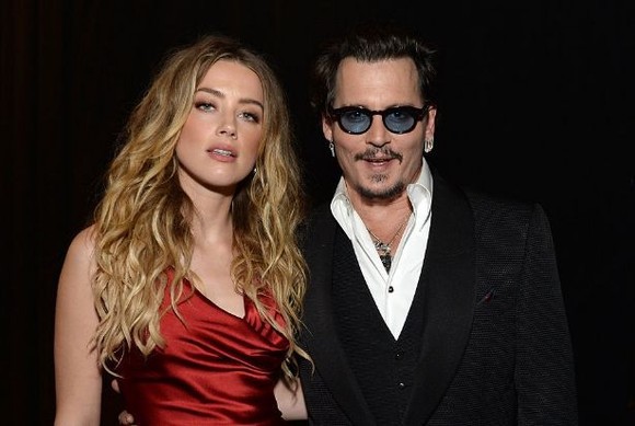 Johnny Depp a dat-o în judecată pe Amber Heard, fosta soție. Actorul îi cere 50 de milioane de dolari despăgubire