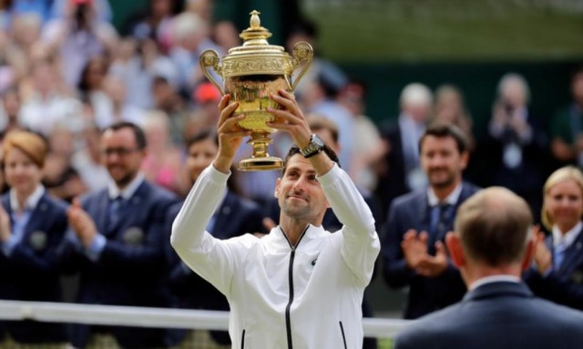 Novak Djokovic și-a apărat titlul la Wimbledon după o finală epică, de 5 ore, împotriva lui Roger Federer
