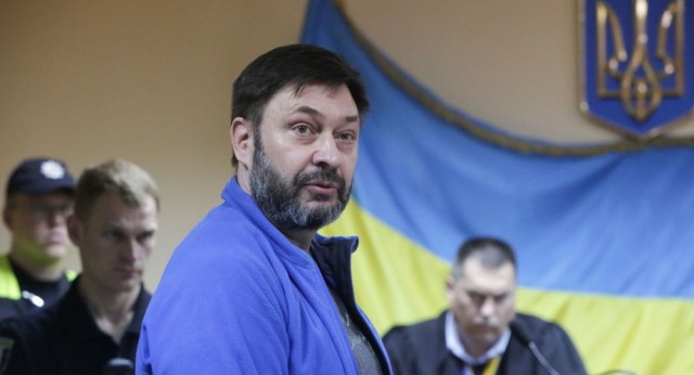 Ucraina: Redactorul-şef al filialei ucrainene a RIA Novosti, acuzat de 'trădare', a fost eliberat condiţionat