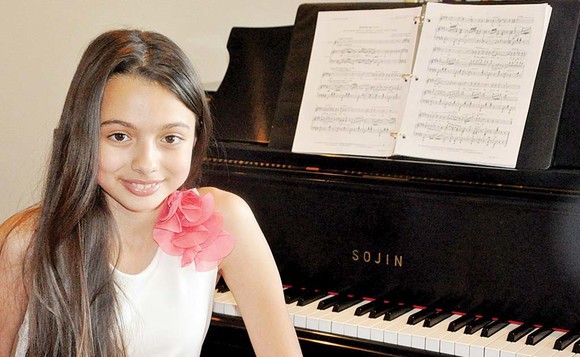 Laura Bretan nu mai are timp de şcoala normală din cauza concertelor. Ce decizie a luat