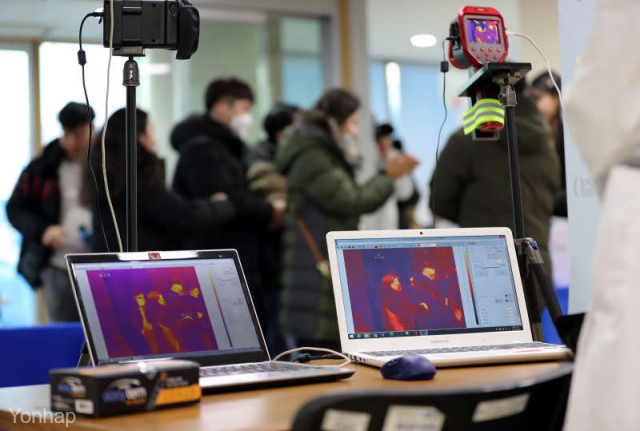 Staţiile de metrou din Beijing au fost dotate cu monitoare termice pentru a verifica temperatura călătorilor