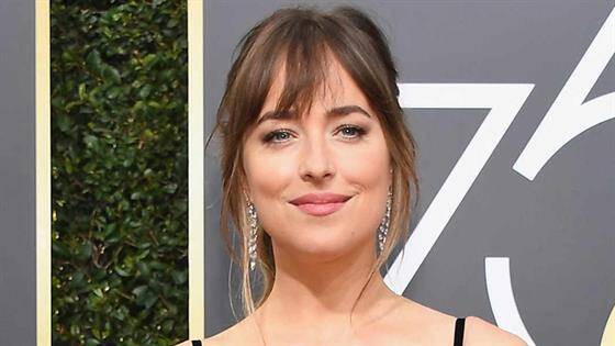 Dakota Johnson, iubita cântăreţului Chris Martin, a regizat un videoclip pentru trupa Coldplay