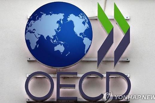 OECD şi-a îmbunătăţit estimările privind evoluţia economiei mondiale