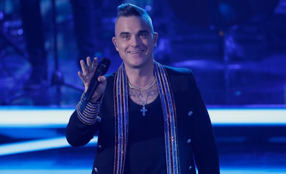 COVID-19 îl costă 250.000 de dolari pe Robbie Williams. Artistul a fost testat pozitiv