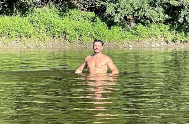 Orlando Bloom a comis-o din nou: A înotat în pielea goală într-un râu!