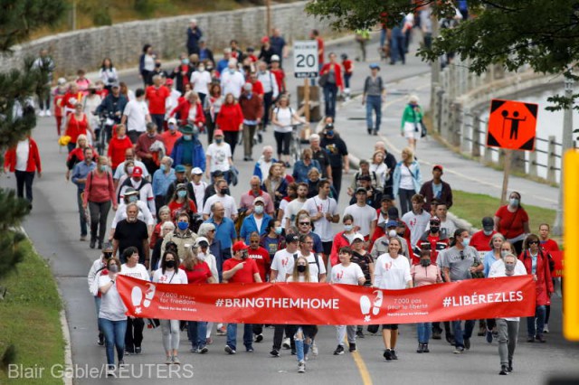 Sute de persoane au manifestat la Ottawa în sprijinul celor doi canadieni ţinuţi în arest în China