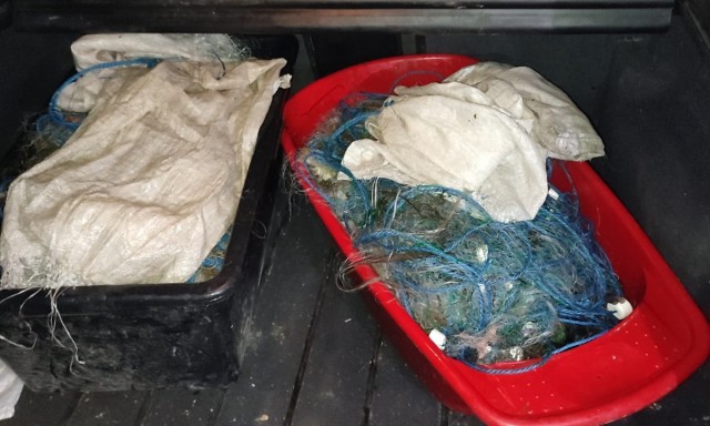 Bărbat prins cu 34 de kg de peşte şi 240 de plasă mono-filament