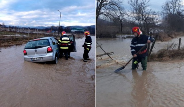 Două persoane, aflate într-o mașină, au fost surprinse de viitură în zona localității Horia