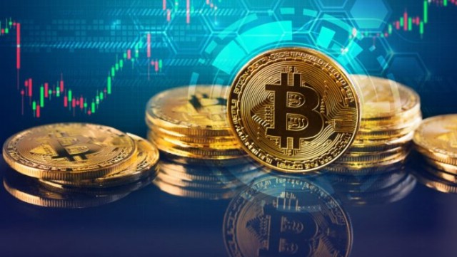 Bitcoin și-a pierdut jumătate din valoare după suma-record atinsă în noiembrie 2021